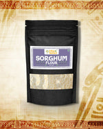 Black resealable pouch of stone-ground jowar flour 1Kg with clear window showing light beige flour inside