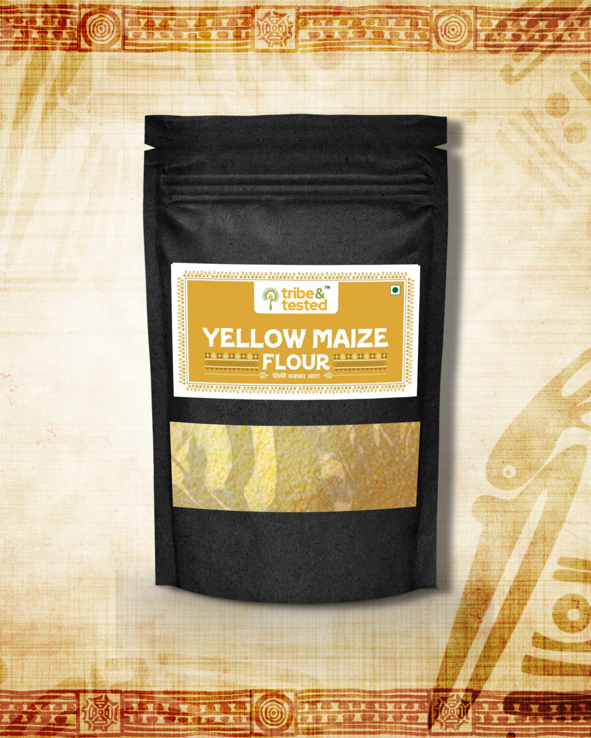 Black stand-up pouch of stone-ground yellow maize flour with a golden label showing product name and branding