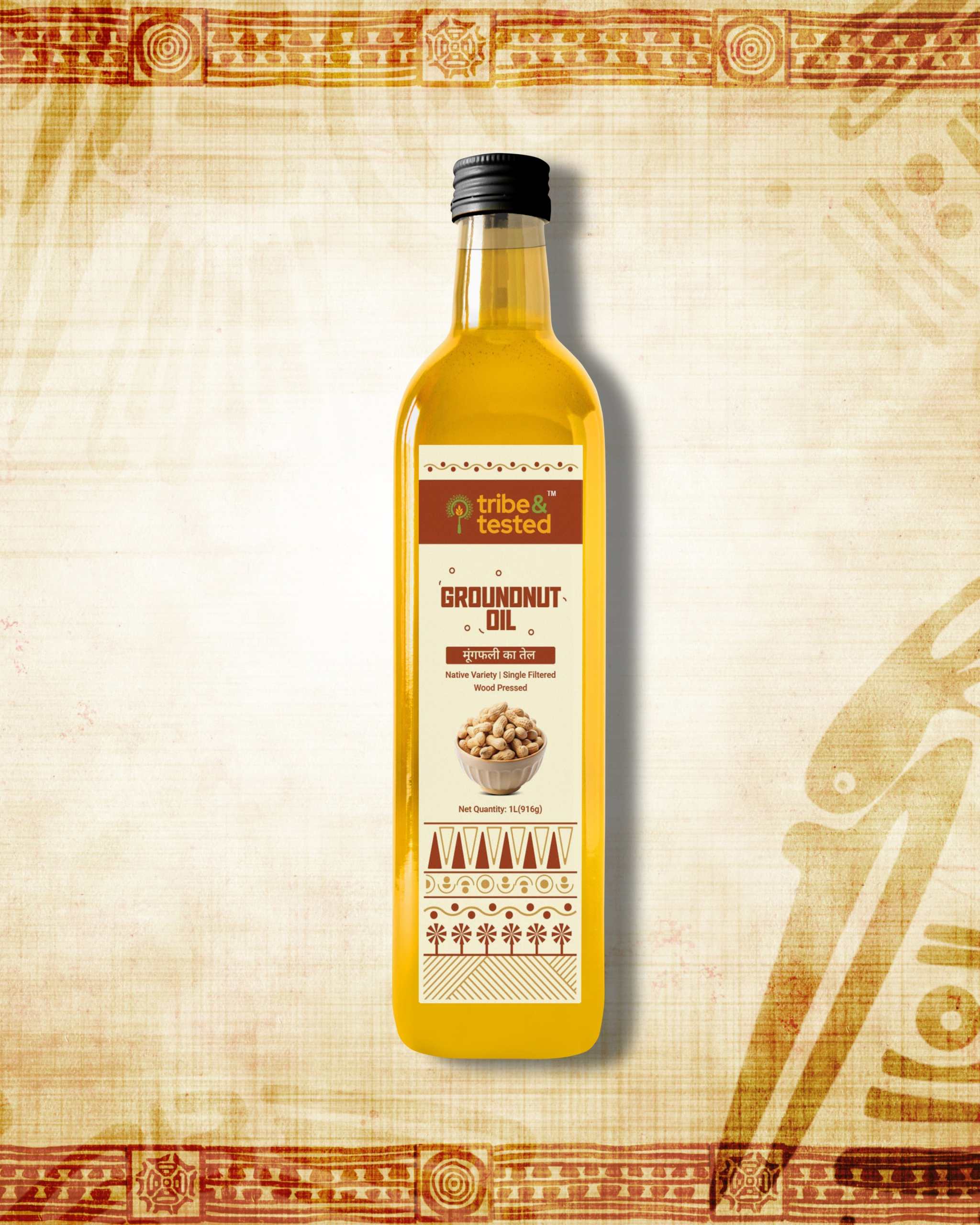 1 litre bottle of wood-pressed groundnut oil with traditional tribal design label