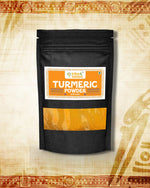 Black pouch packaging of stone-ground turmeric powder with an orange and white label showing "Turmeric Powder" text